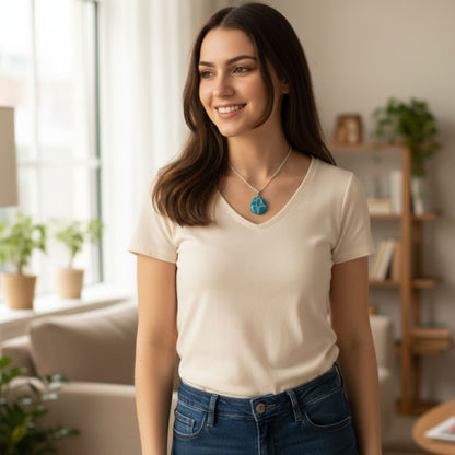 Pendentif Résine Ovale Bleu Océan et Veines Argentées