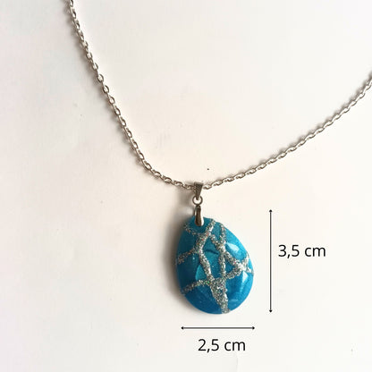 Pendentif Résine Ovale Bleu Océan et Veines Argentées