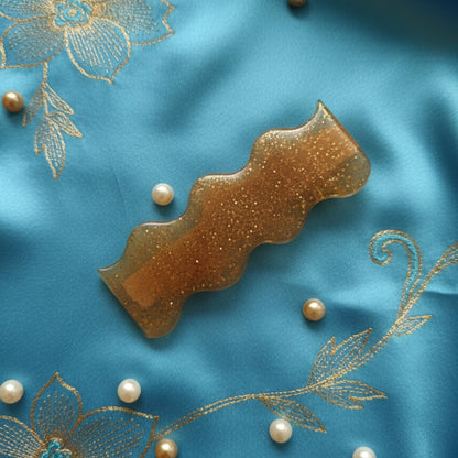 Pince à Cheveux Vague Caramélisée en Résine avec Fines Paillettes Dorées